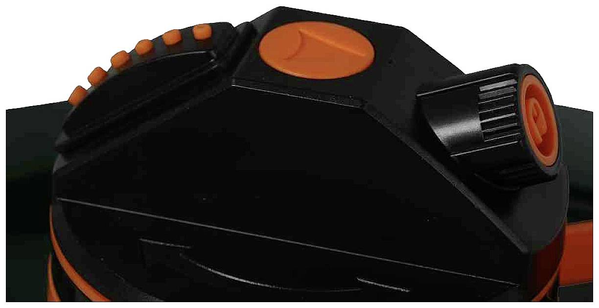 Ein schwarzer, orange-akzentuierter Verschlussmechanismus mit einem Drehknopf und mehreren Tasten.