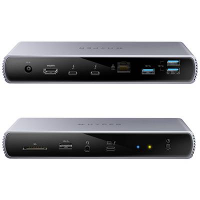 Ein silbernes Dock mit verschiedenen Anschlüssen: Stromanschluss, HDMI, Thunderbolt, Ethernet, USB-Anschlüsse, SD-Kartenleser.