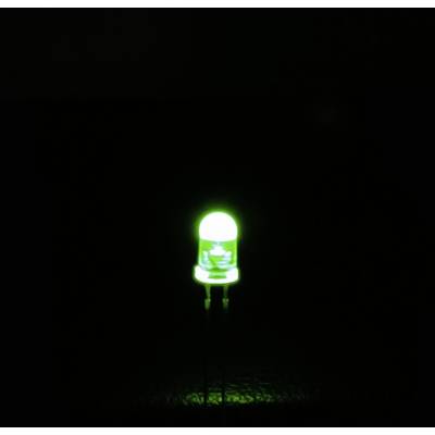 Eine leuchtende grüne LED auf dunklem Hintergrund.