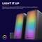 RGB-Lautsprecher mit leuchtendem LED-Licht, zeigen eine bunte Farbpalette. Text oben: 'LIGHT IT UP'.