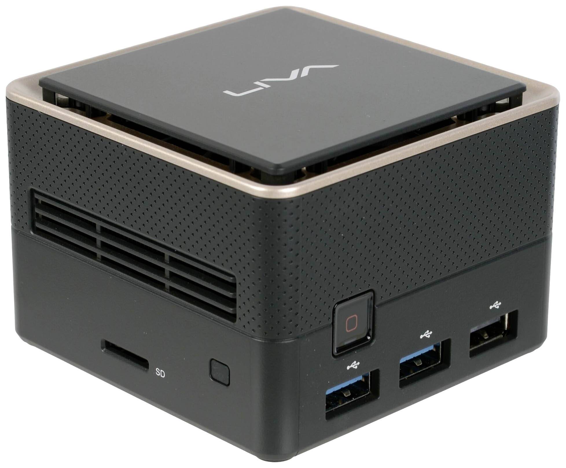 Ein kompakter, quadratischer Mini-PC mit mehreren USB-Anschlüssen und einem SD-Kartenslot auf der Vorderseite.