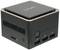 Ein kompakter, quadratischer Mini-PC mit mehreren USB-Anschlüssen und einem SD-Kartenslot auf der Vorderseite.