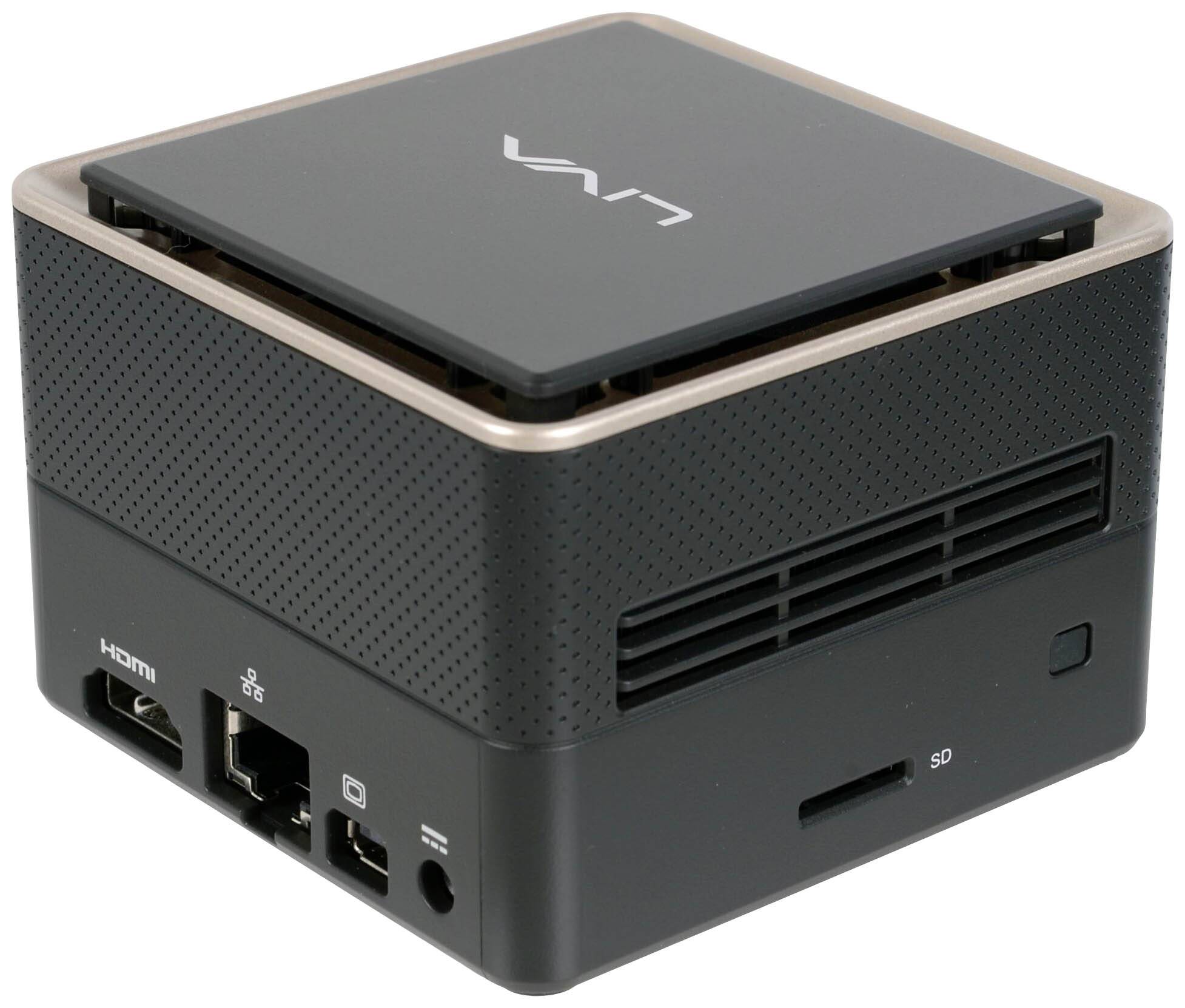 Ein kompakter, quadratischer Mini-PC mit Anschlüssen für HDMI, USB und Ethernet. Schwarz mit dezenten Metallic-Akzenten.