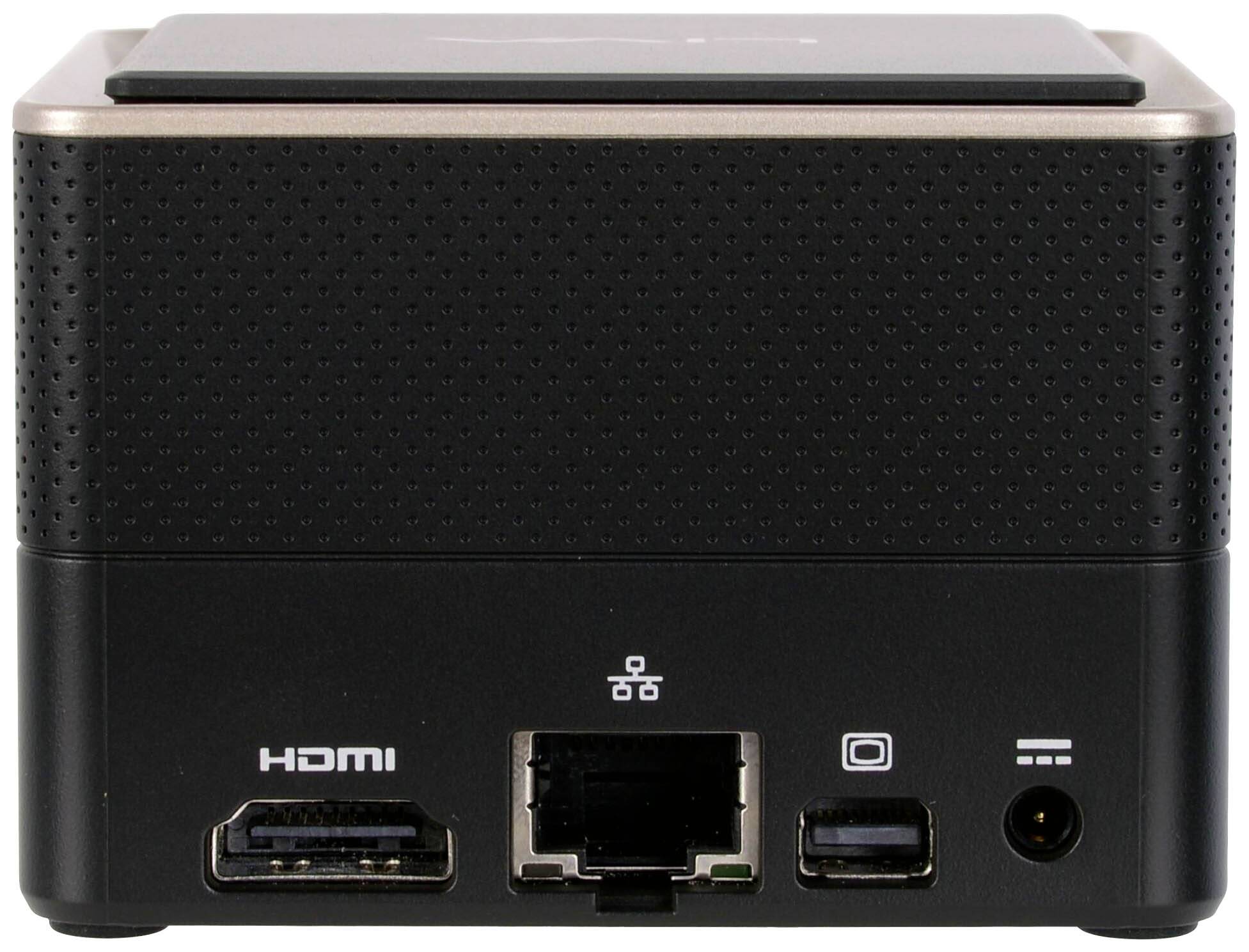 Ein kleiner schwarzer Würfel-Computer mit verschiedenen Anschlüssen: HDMI, Ethernet, USB und ein Anschluss für Stromversorgung.