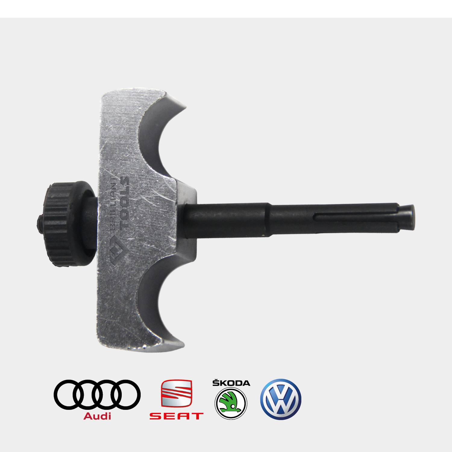 Ein Werkzeugaufsatz mit drei Klingen und einem schwarzen Griff, darunter Logos von Audi, SEAT, Škoda und Volkswagen.