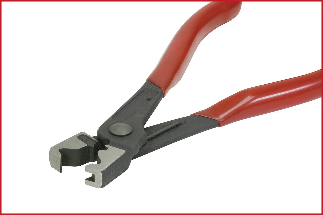 Eine rote Abisolierzange mit schwarzen Griffen, die zum Entfernen der Isolierung von elektrischen Kabeln verwendet wird.