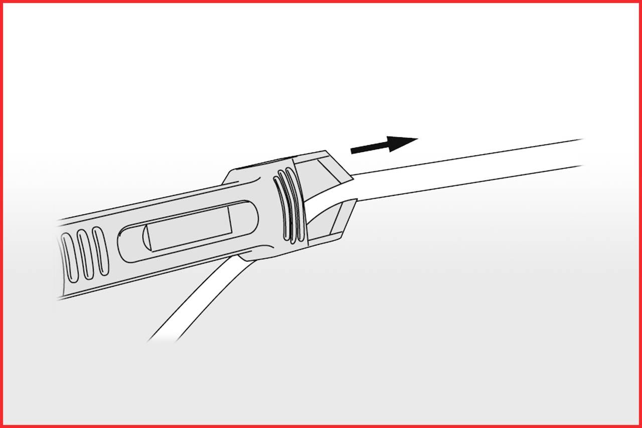 Ein Kabel wird durch einen Werkzeugschlitz in eine Richtung gezogen, angezeigt durch einen Pfeil.