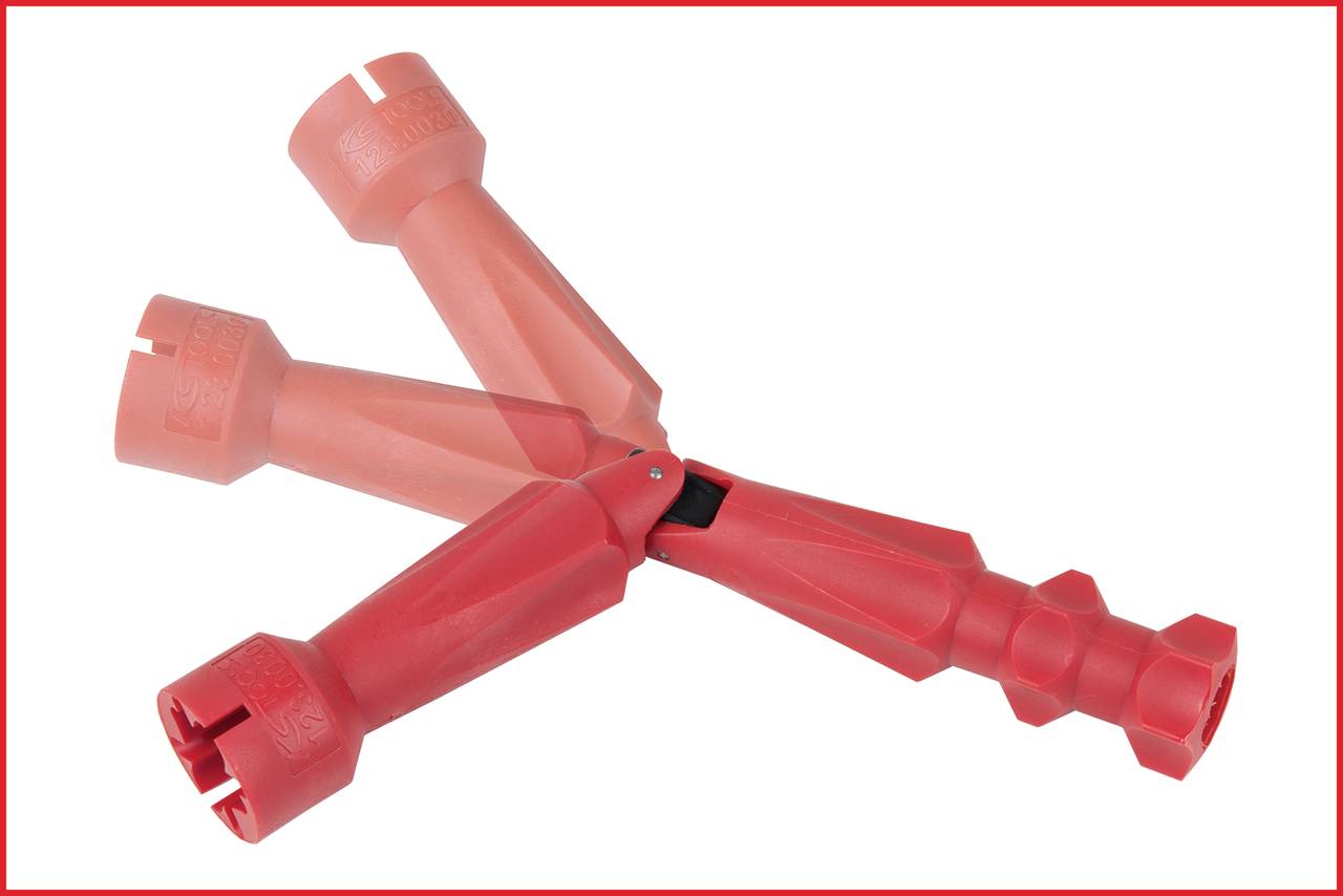 Rotes, dreifach verzweigtes Werkzeug mit drei Armen und gezahnten Köpfen, ausgelegt für spezifische Montage- oder Demontageanwendungen.