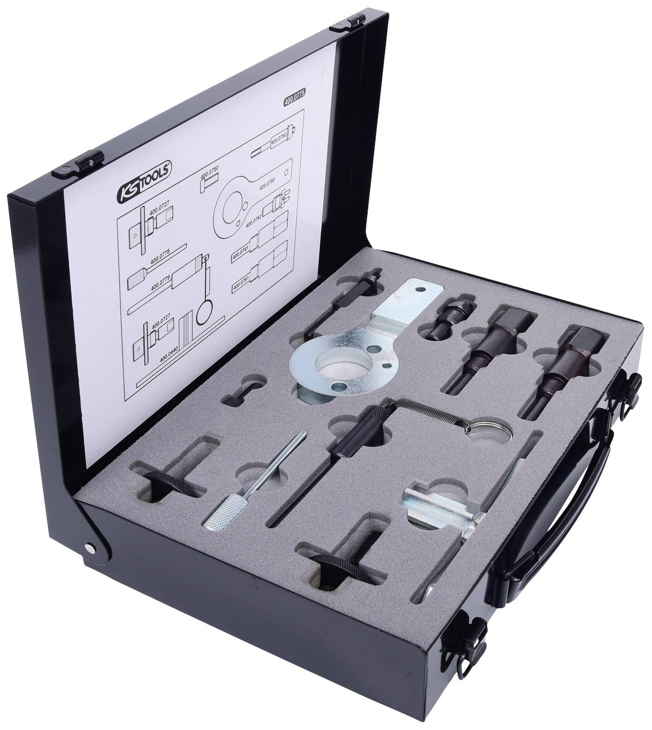 Ein offener Werkzeugkoffer mit verschiedenen präzisen Werkzeugen und einer Anleitung im Deckel. Tools sind sicher in Schaumstoff eingebettet.