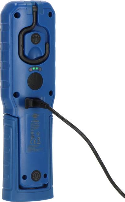 Ein blaues, tragbares elektronisches Gerät mit eingestecktem Kabel, vermutlich ein Batterietester oder Ladegerät. Zeigt LED-Anzeigen.