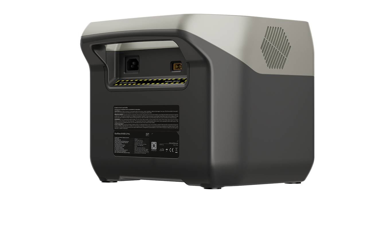 Ein graues, tragbares Gerät mit Belüftungsschlitzen und einem Griff, geeignet für den einfachen Transport und den Einsatz im Freien.