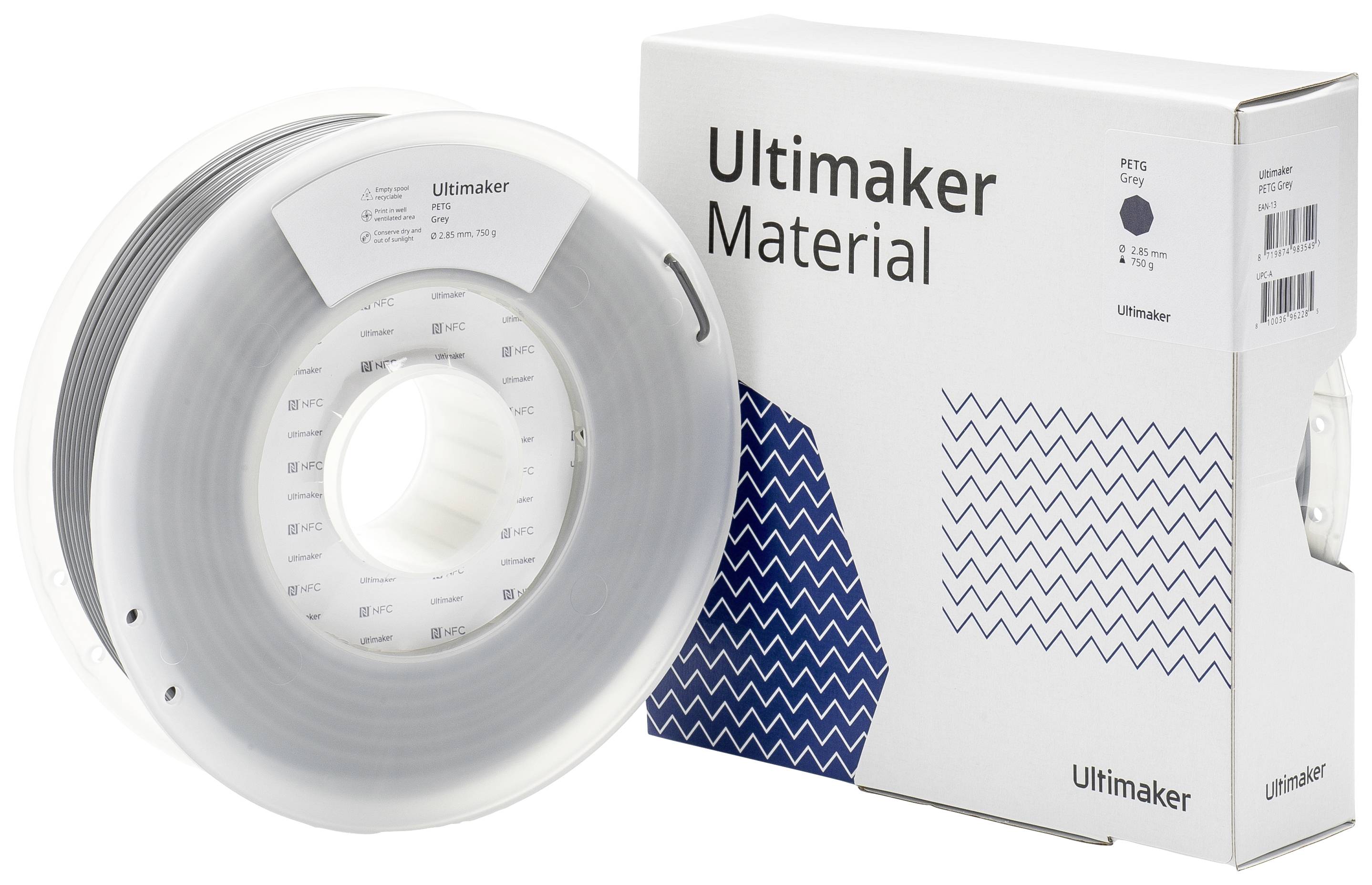 Eine Rolle mit grauem Filament vor einer Verpackung mit der Aufschrift 'Ultimaker Material', geeignet für 3D-Drucker.