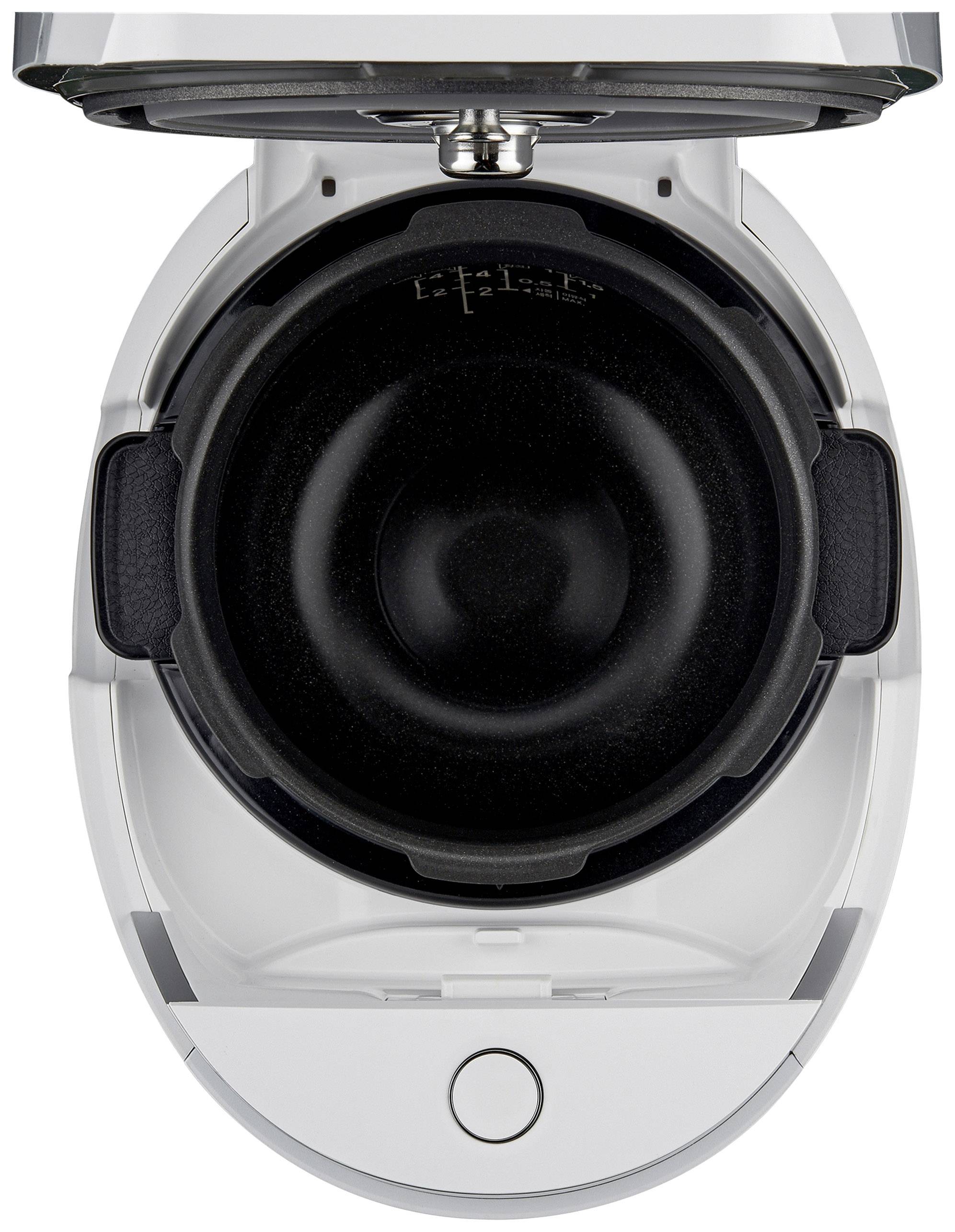 Ein weißer Kaffeekapselautomat von oben gesehen. Der Maschinenkopf ist geöffnet und der Kapselhalter ist leer.