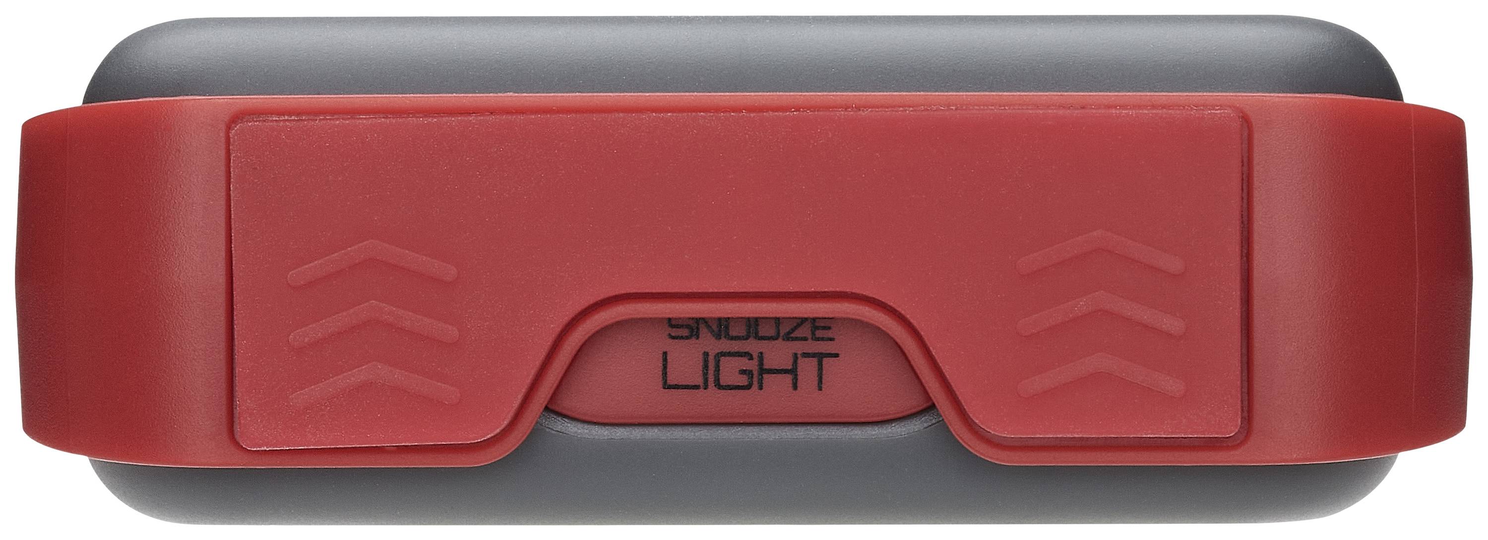 Wecker mit grauem Gehäuse und roter 'Snooze'-Taste.