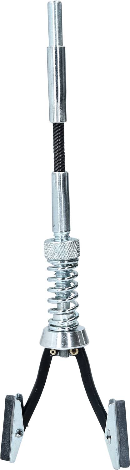 Ein Metallwerkzeug mit Griff, Federmechanismus und Greifzangen am Ende, verwendet zum Erreichen und Greifen kleiner Objekte.