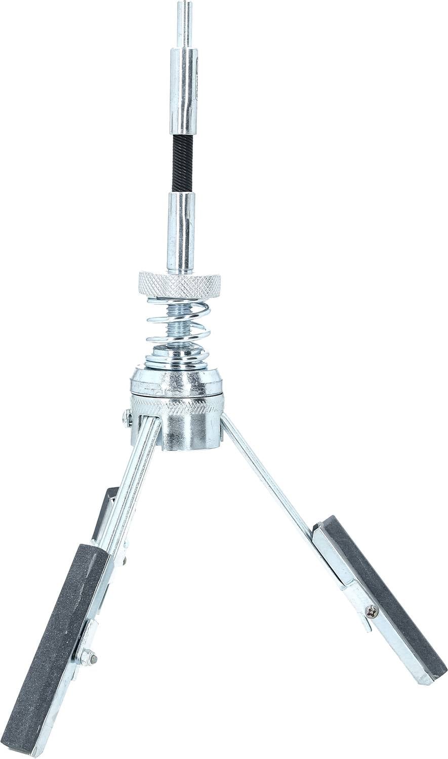 Metallisches Stativ mit drei stabilen Beinen und ausziehbarem Mittelrohr, geeignet für leichte Kameras oder Mikrofone.