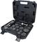 Ein offener schwarzer Werkzeugkoffer mit verschiedenen Aufsätzen und einem Werkzeug, geordnet in vorgeformten Fächern.