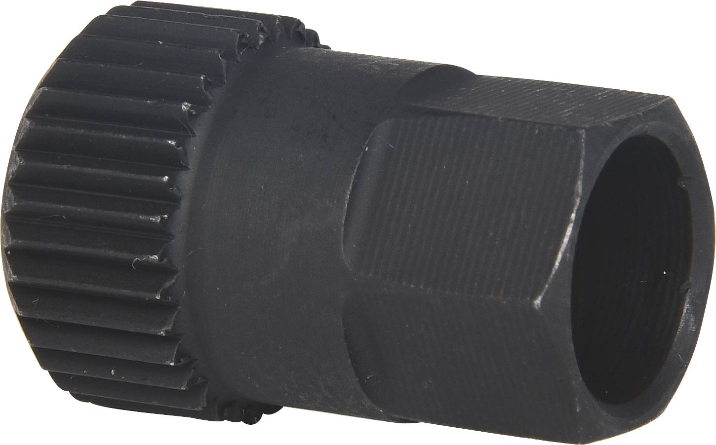 Ein schwarzes Fahrradwerkzeug aus Metall, Hex-Form mit geriffeltem Rand zur Befestigung oder Entfernung von Teilen an Fahrrädern.