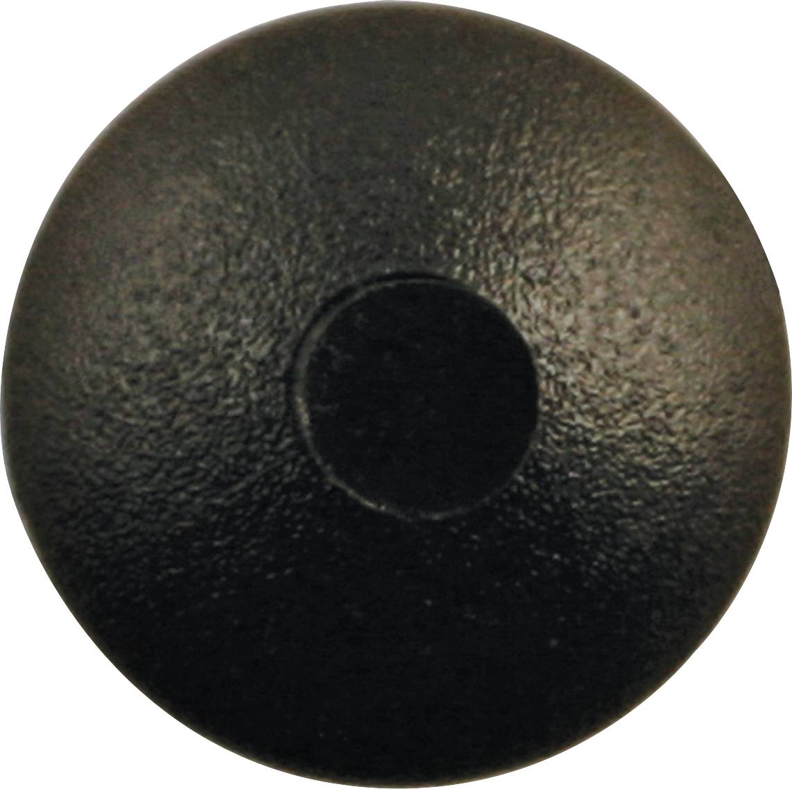 Ein runder, schwarzer Knopf ohne sichtbare Beschriftung oder Symbole, auf einer glatten Oberfläche zentriert.