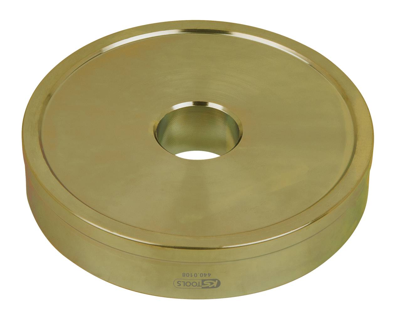 Eine goldene runde Metallplatte mit zentralem Loch, auf einer hellen Oberfläche liegend. Aufschrift 'KS TOOLS' und Zahlen sichtbar.