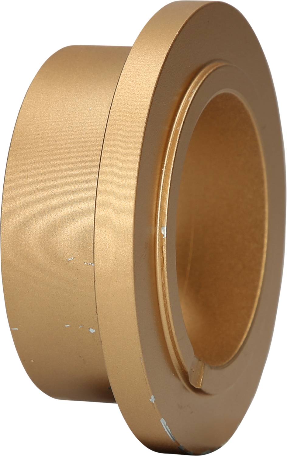 Goldene zylindrische Metallkomponente mit abgerundeten Kanten und deutlichen Abnutzungserscheinungen.