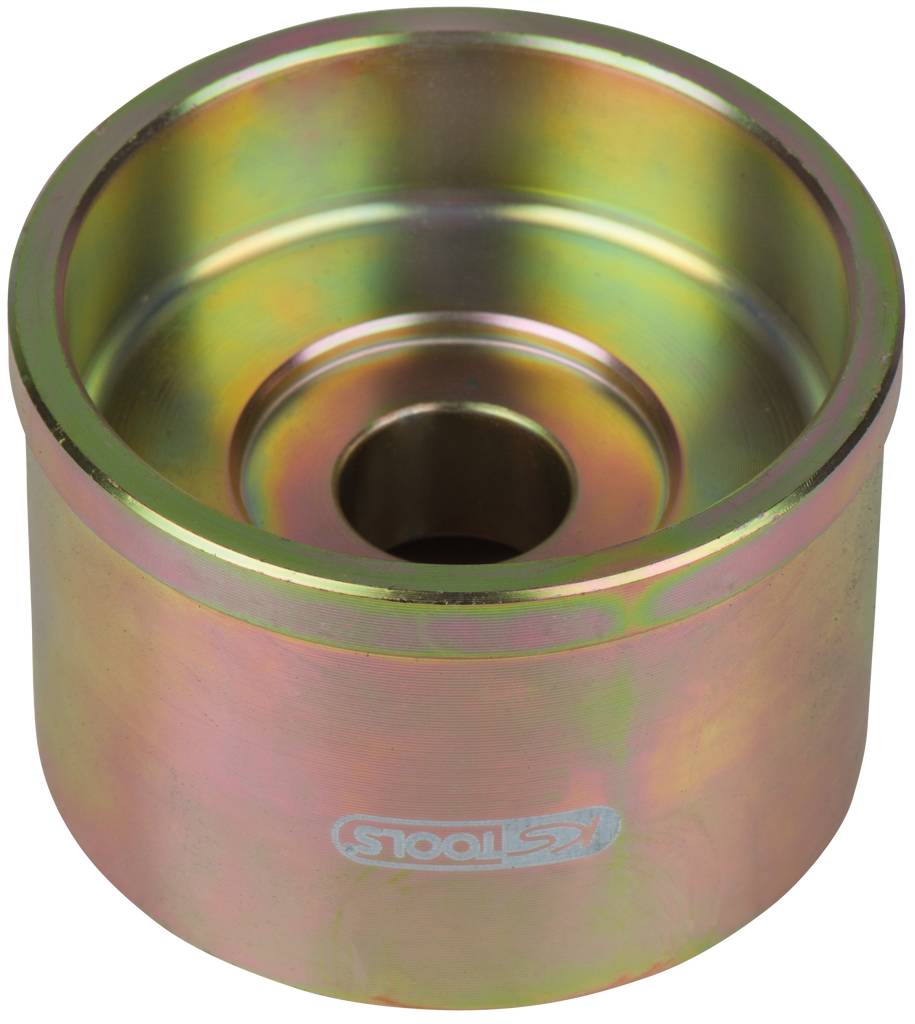 Ein zylindrisches Werkzeug aus Metall, vermutlich ein Lagersitz, mit goldener Beschichtung und Gravur 'KS Tools' auf der Seite.