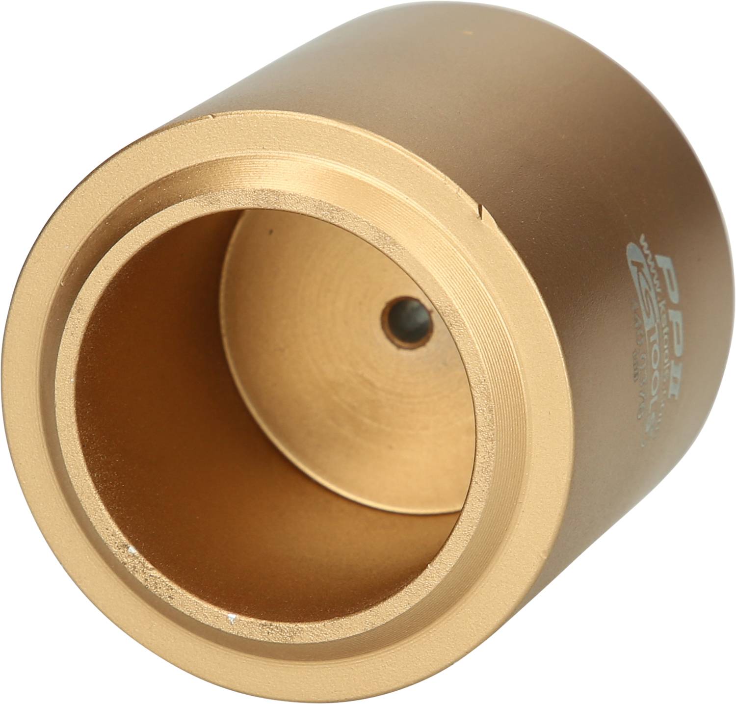 Ein zylindrisches Metallgehäuse in goldener Farbe mit einem offenen, hohlen Inneren, möglicherweise ein Teil eines mechanischen Gerätes.