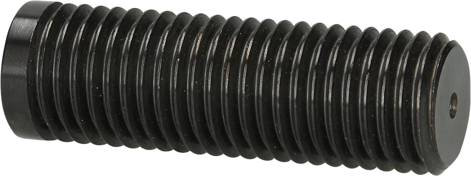 Ein schwarzer, geriffelter Zylinder, ähnlich einer Metallstange oder Baukomponente, liegt waagerecht auf einem hellen Hintergrund.
