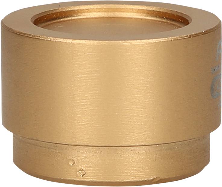 Ein kleiner zylindrischer, messingfarbener Metallkörper.