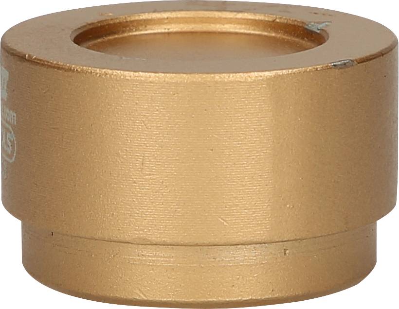 Ein goldenes, zylindrisches Metallteil mit einer zentralen Vertiefung.