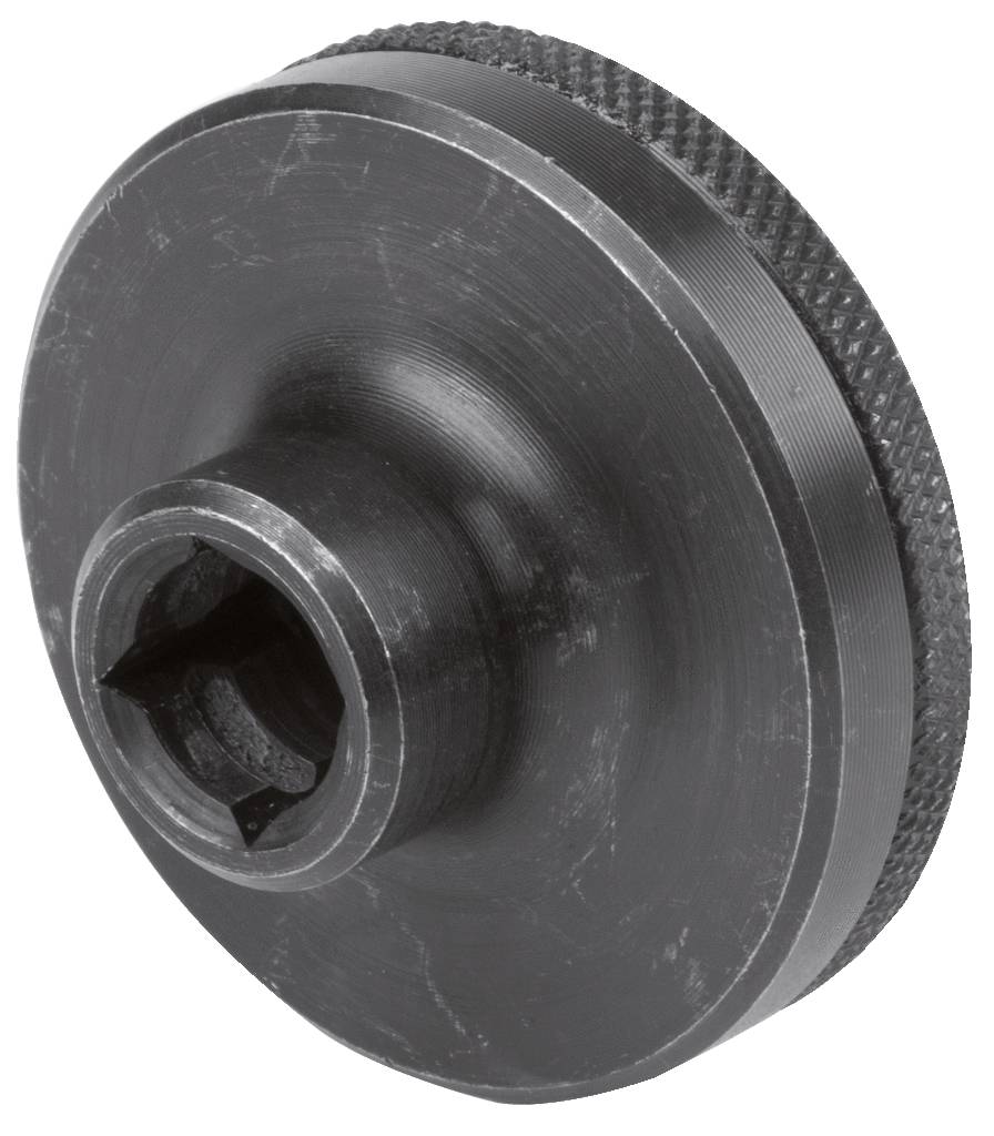 Metallscheibe mit geriffeltem Rand und zentraler Bohrung für Werkzeugeinsatz, möglicherweise Teil eines mechanischen Systems.