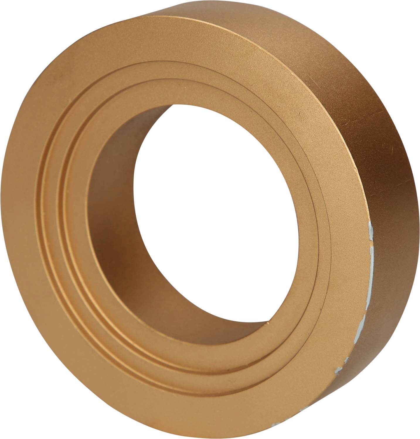 Goldene, kreisförmige Metallkomponente mit zylindrischem Hohlraum und gerillter Oberfläche.