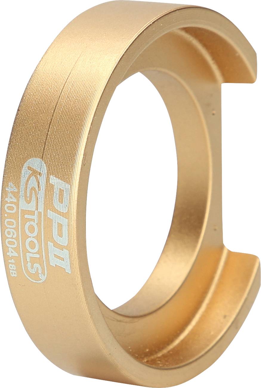 Goldener Ring mit Aufschrift 'KS TOOLS'. Werkzeugtyp schwer erkennbar, könnte ein Adapter oder Teil eines Werkzeugs sein.