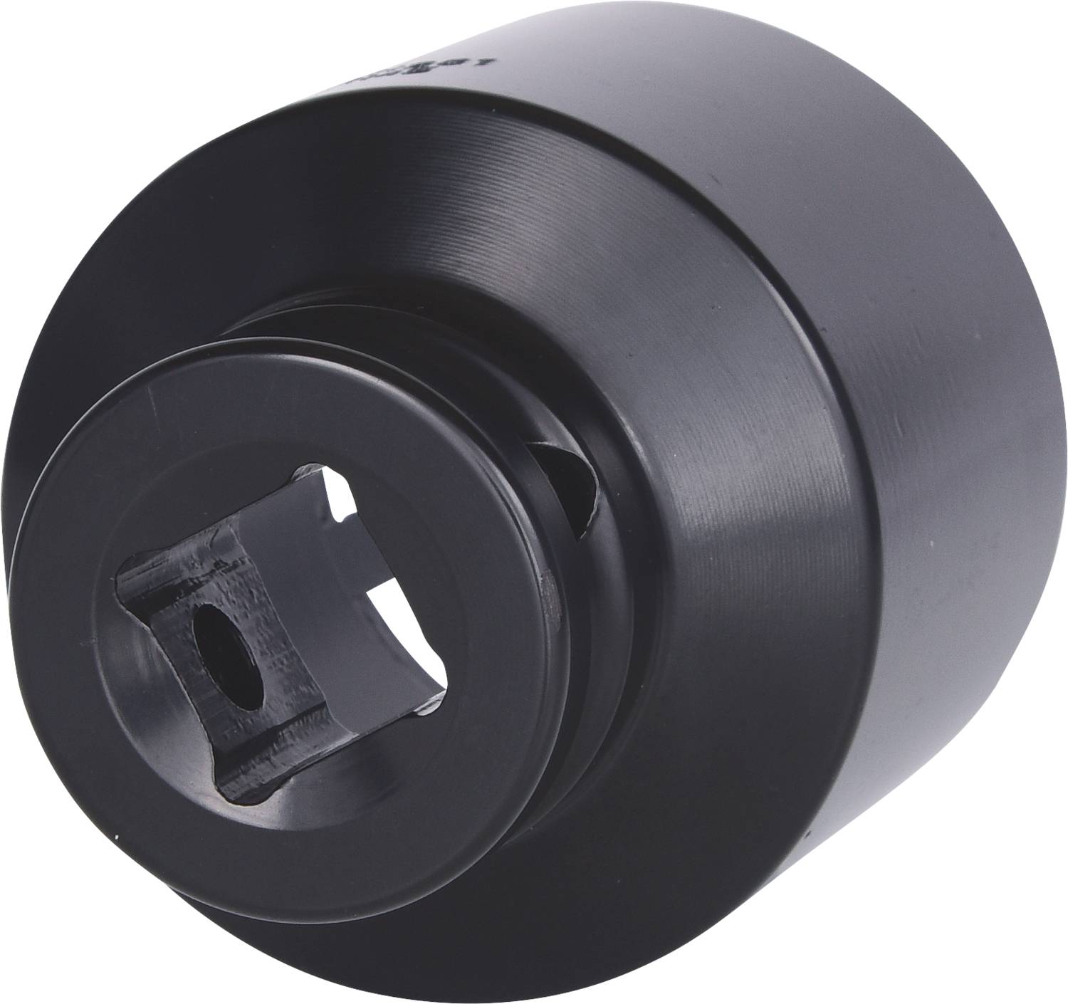 Schwarzes zylindrisches Maschinenteil mit quadratischer Öffnung und glatter Oberfläche, möglicherweise für mechanische Anwendungen.