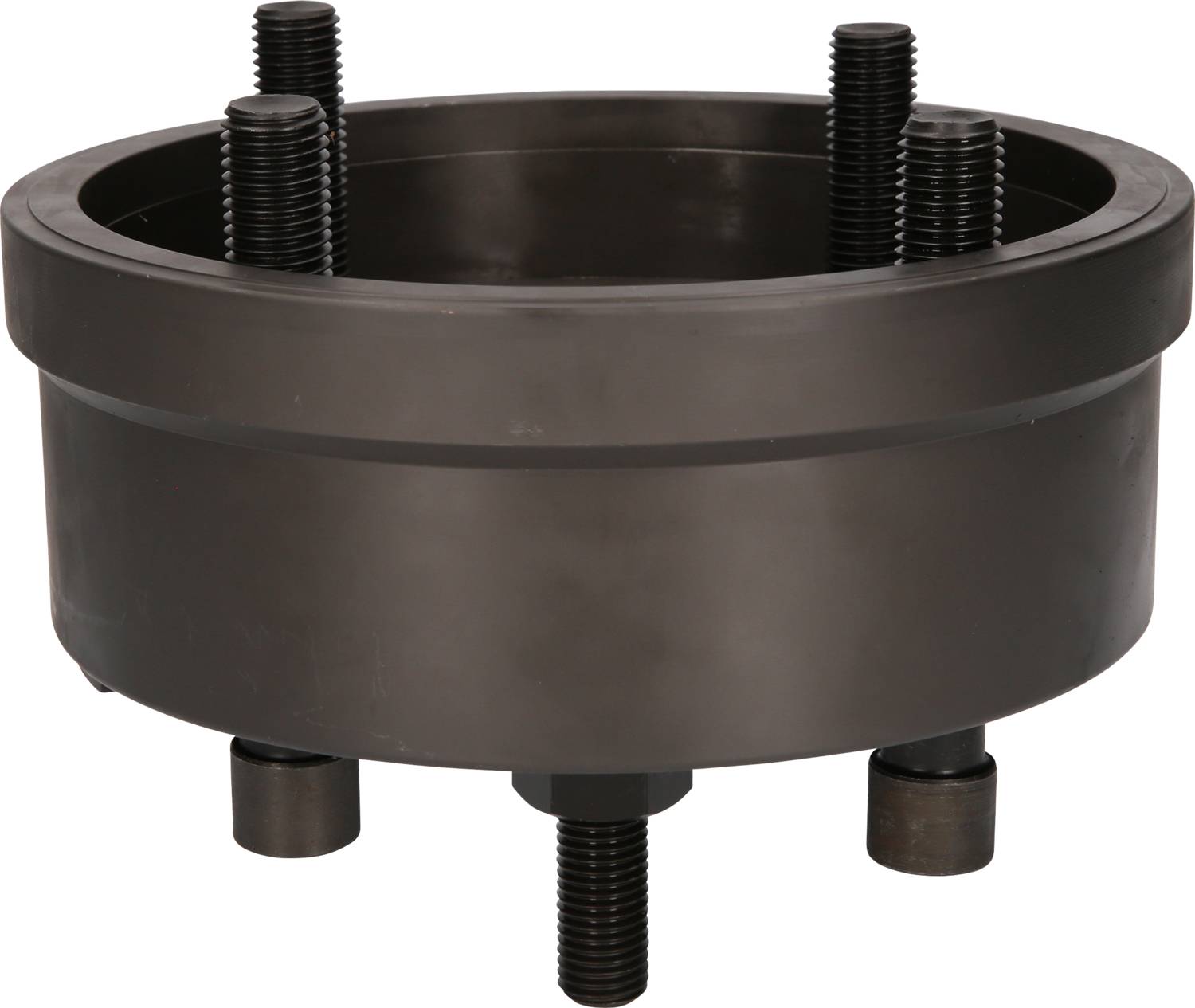 Ein rundes, dunkles Metallteil mit mehreren hervorstehenden Schrauben, möglicherweise ein Maschinenteil oder eine technische Komponente.