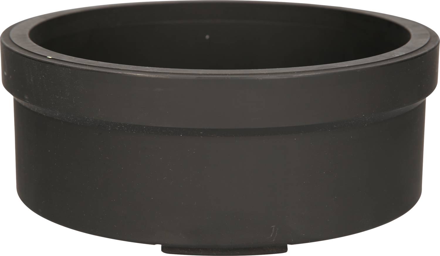 Schwarze, runde, flache Plastikschale auf hellem Hintergrund, ohne erkennbare Kennzeichen oder Inhalt.
