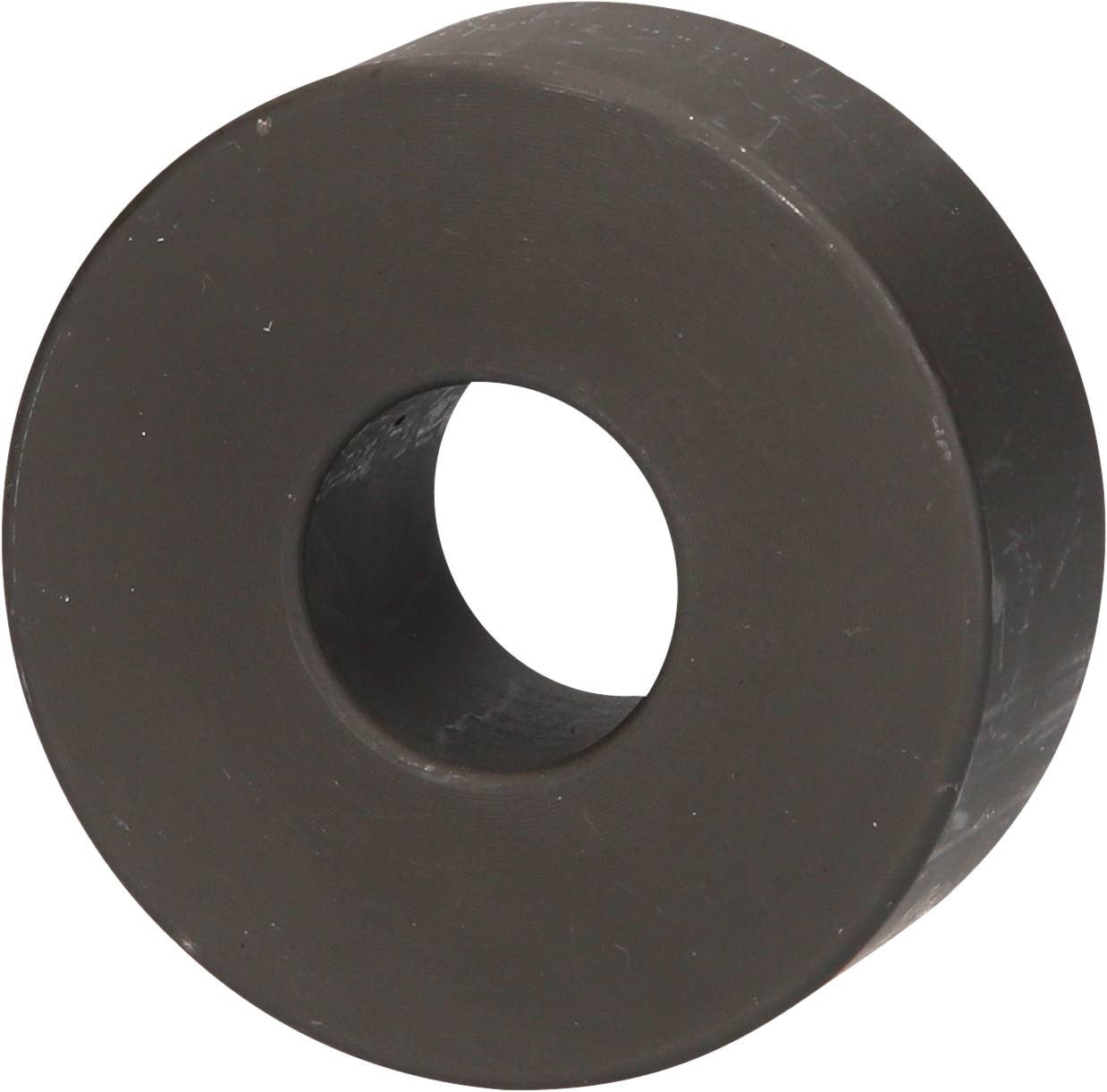 Rundes, schwarzes Ferritmagnet mit zylindrischem Loch in der Mitte.