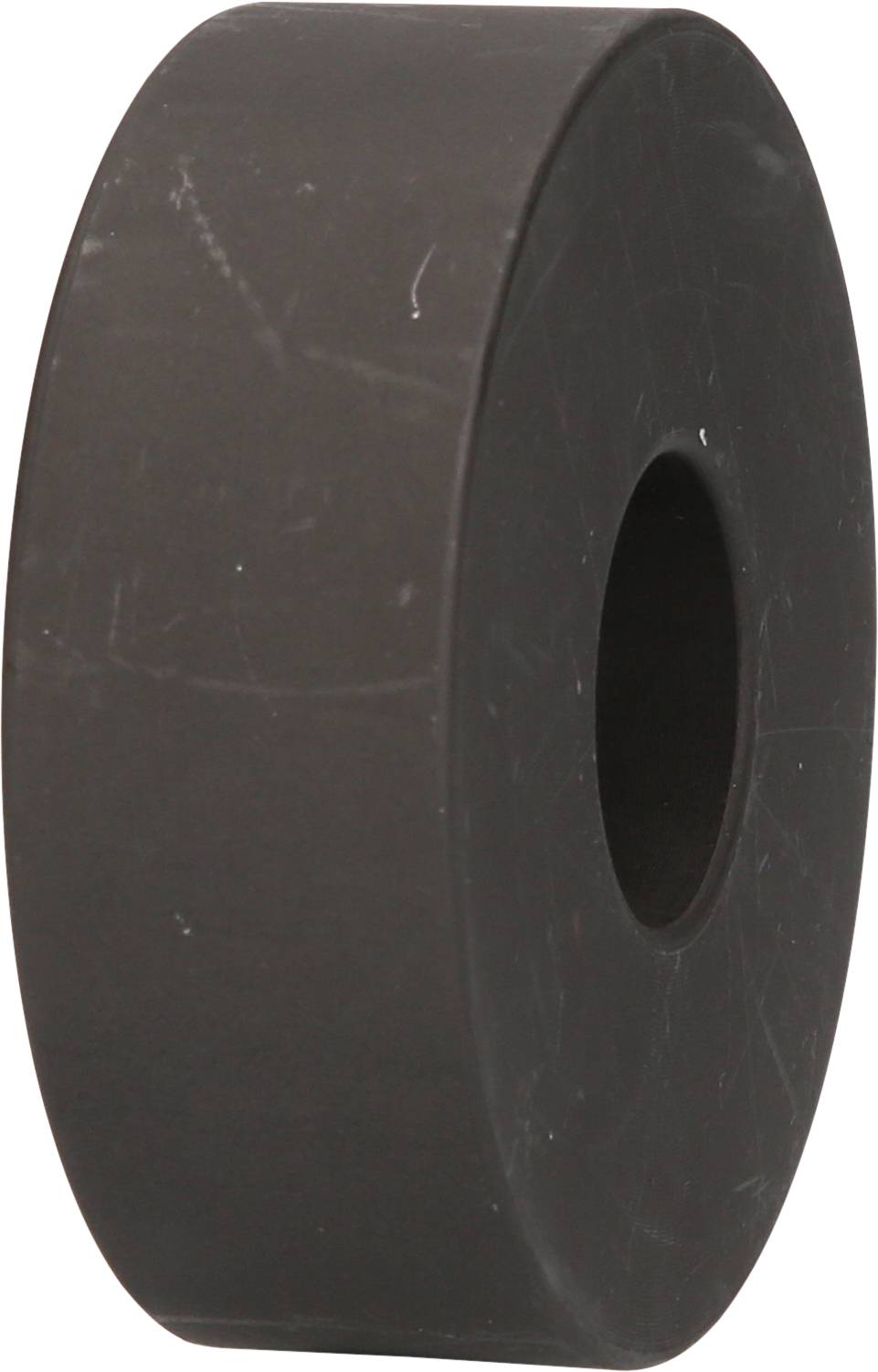 Eine schwarze, zylindrische Gummischeibe mit einem Loch in der Mitte, möglicherweise ein Teil eines technischen Geräts oder einer Maschine.
