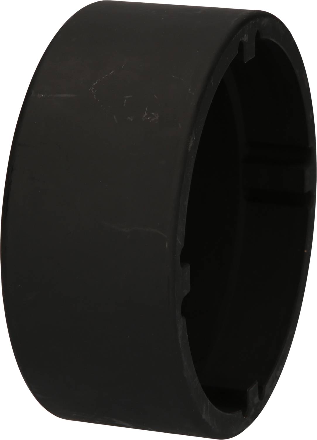 Ein schwarzer, zylindrischer Ring aus Kunststoff, möglicherweise eine Komponente oder ein Ersatzteil. Keine weiteren Details sichtbar.