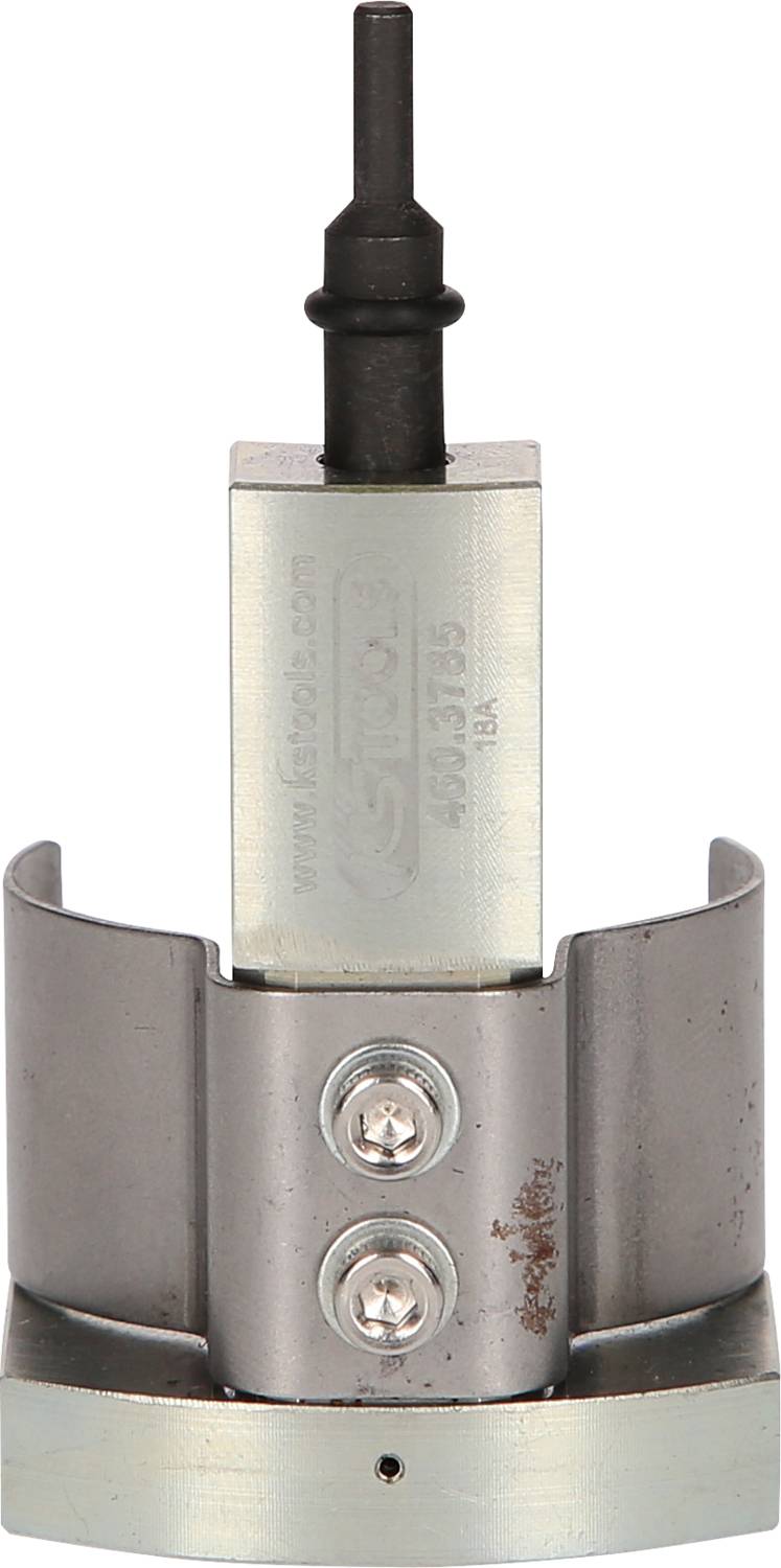 Ein zylindrisches Metallwerkzeug mit zwei Schrauben, oberem Stift und seitlichen Aussparungen. Verwendet für industrielle Anwendungen.