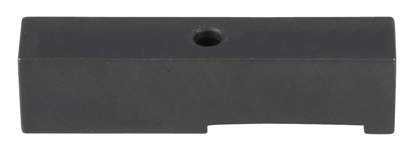 Ein rechteckiger, schwarzer Metallblock mit einem zentralen Loch.