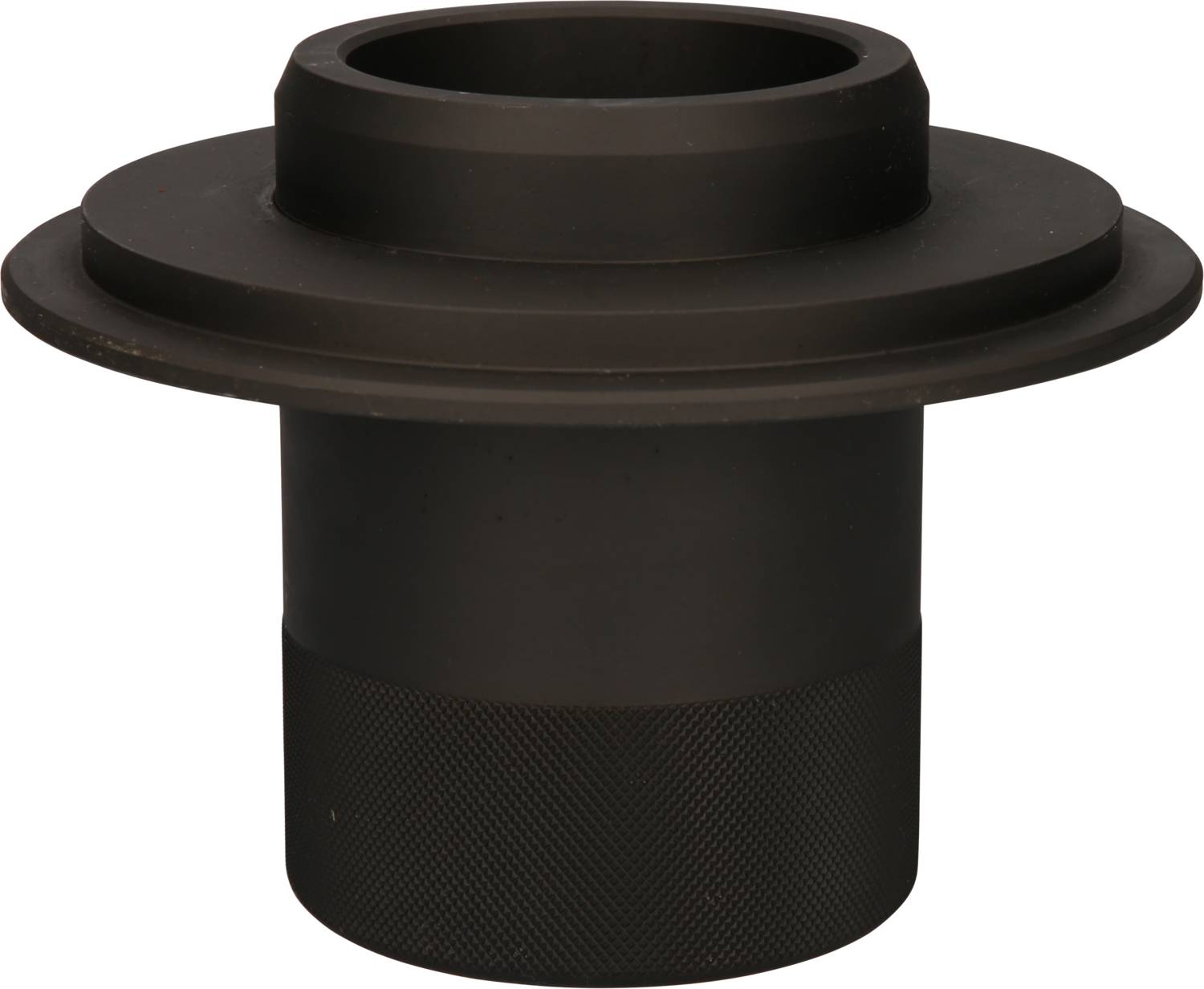 Ein schwarzes, zylindrisches Metallteil mit gerändelter Oberfläche unten und einem breiten Flansch oben. Verwendung unklar.