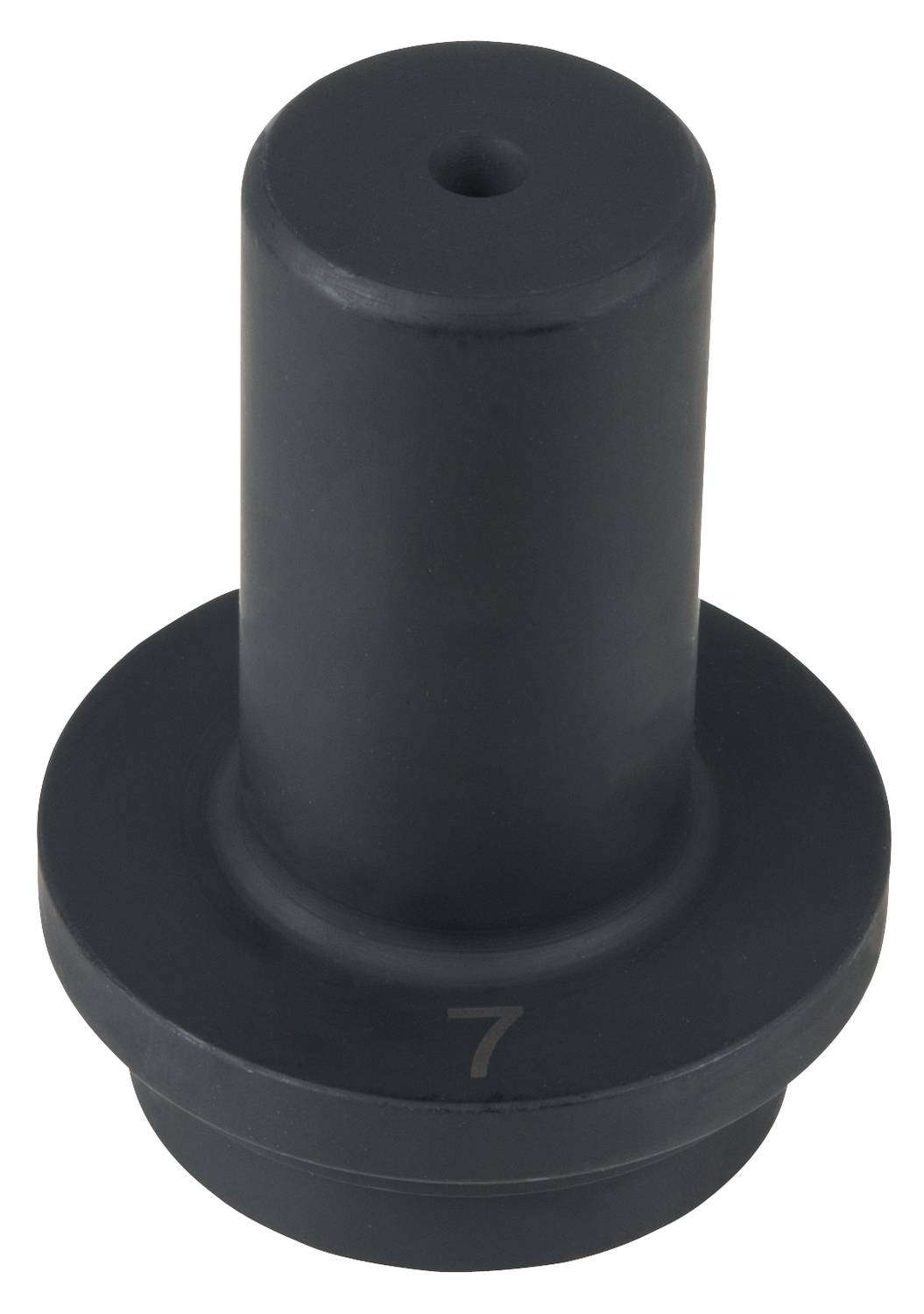 Ein schwarzes, zylindrisches Bauteil mit einer Basis. Es hat oben ein kleines Loch und eine eingravierte Zahl '7' auf der Seite.