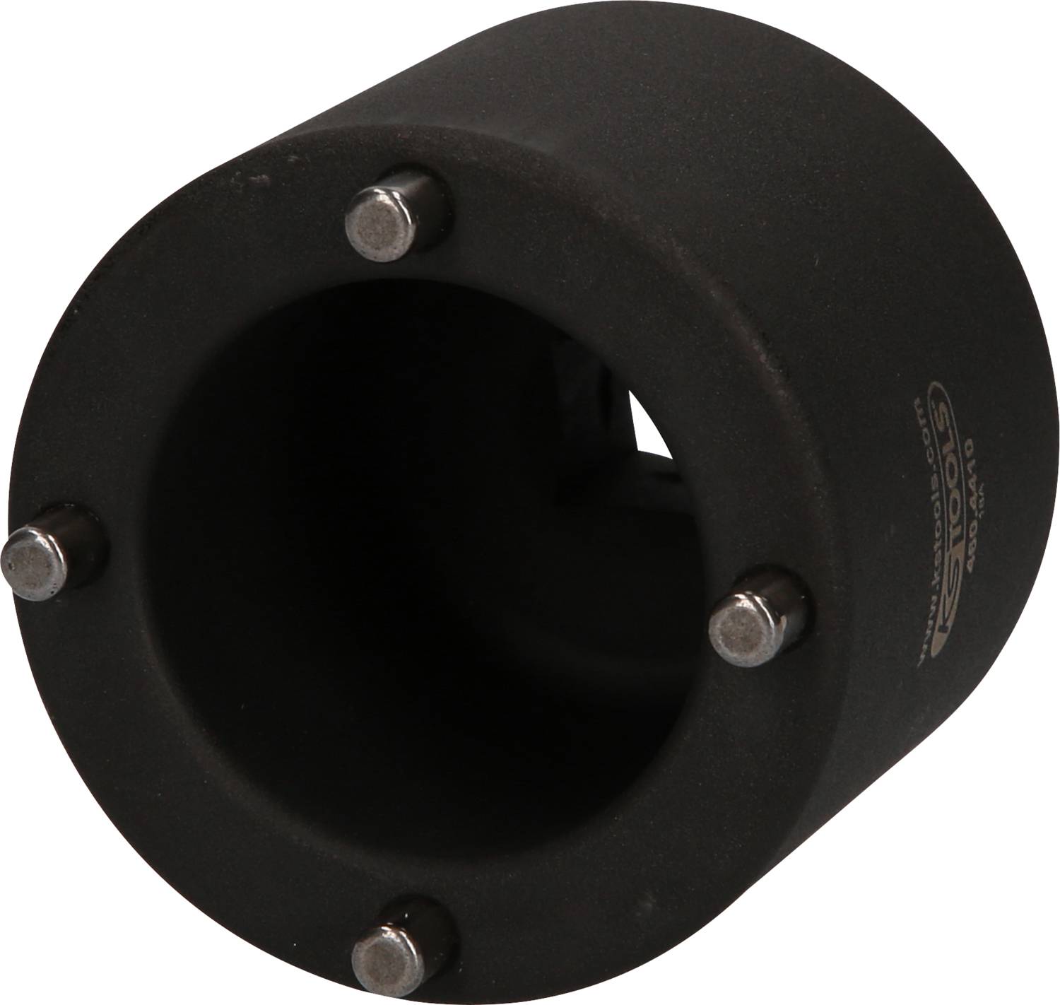 Ein zylindrisches Metallobjekt mit fünf Schrauben an der Vorderseite. Es könnte ein mechanischer Teil oder eine Komponente sein.