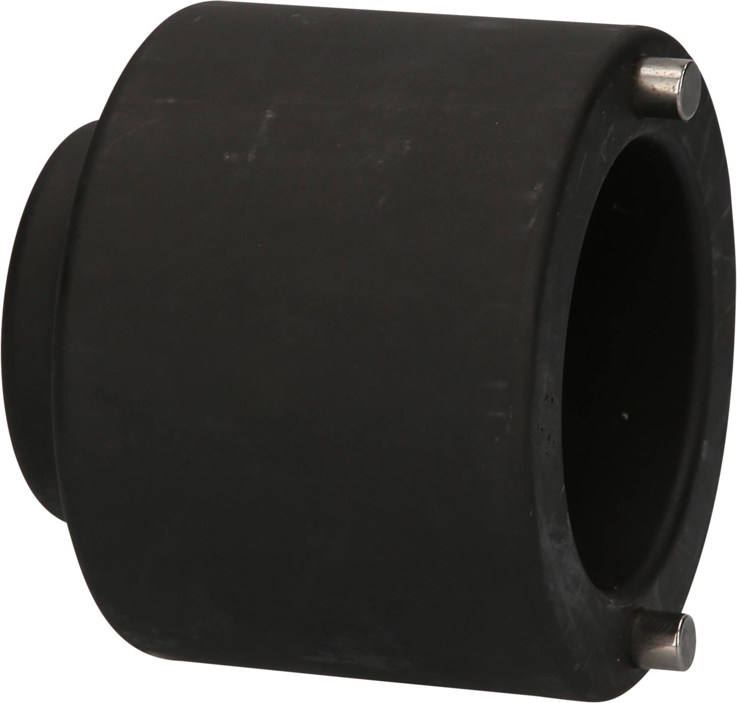 Ein schwarzer, zylindrischer Adapter mit zwei Metallstiften sichtbar an der Seite.
