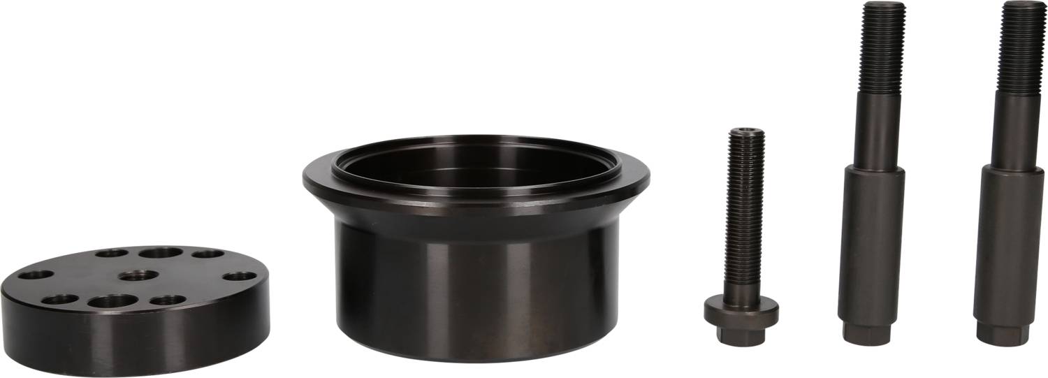 Metallische Maschinenteile: Zylinder, Scheibe mit Löchern, schraubenartige Stifte. Teile für eine technische Montage oder Reparatur.