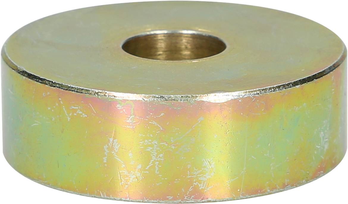 Metallring mit zentralem Loch, leicht reflektierende goldene Oberfläche.