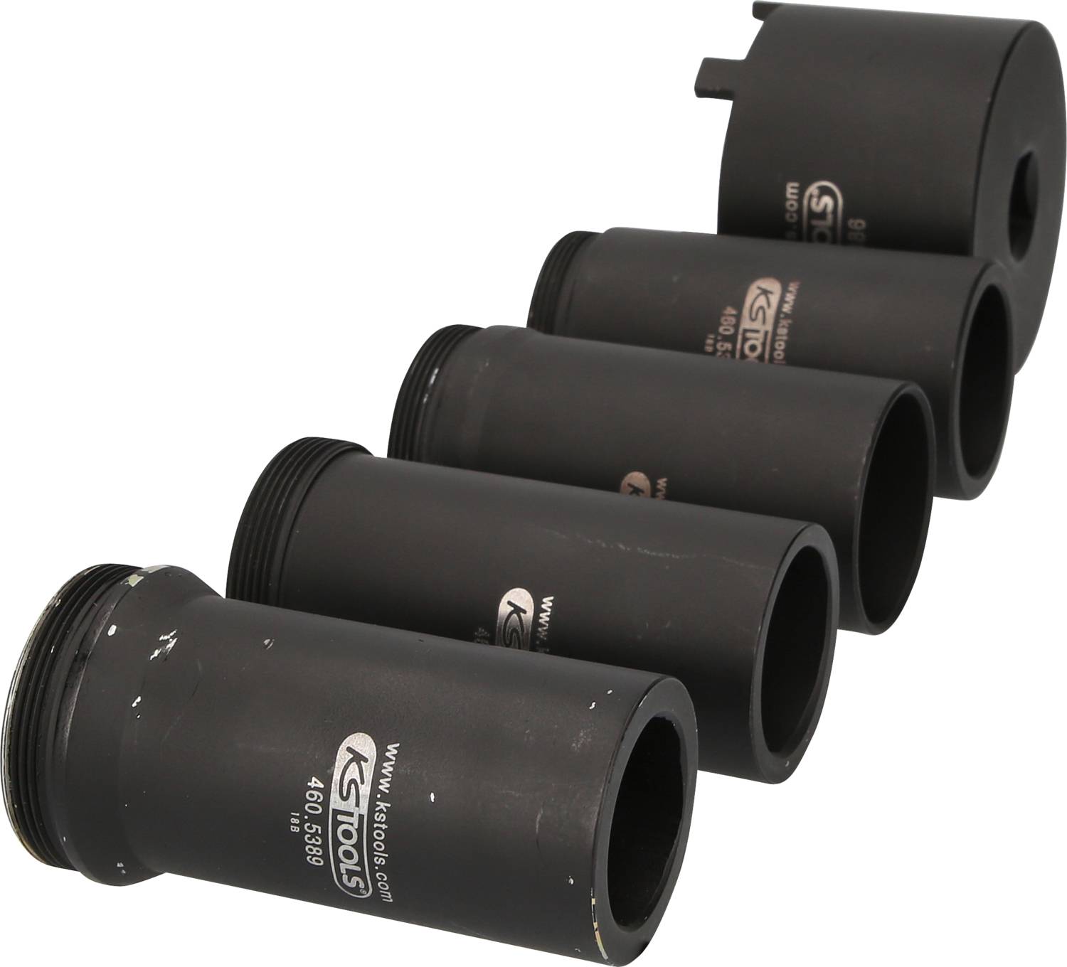 'Fünf hintereinander aufgereihte schwarze Zylinder, verschiedene Größen, mit technischem Design.'