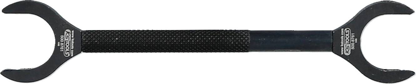 Ein schwarzer doppelendiger Schraubenschlüssel mit geriffeltem Griff liegt horizontal.