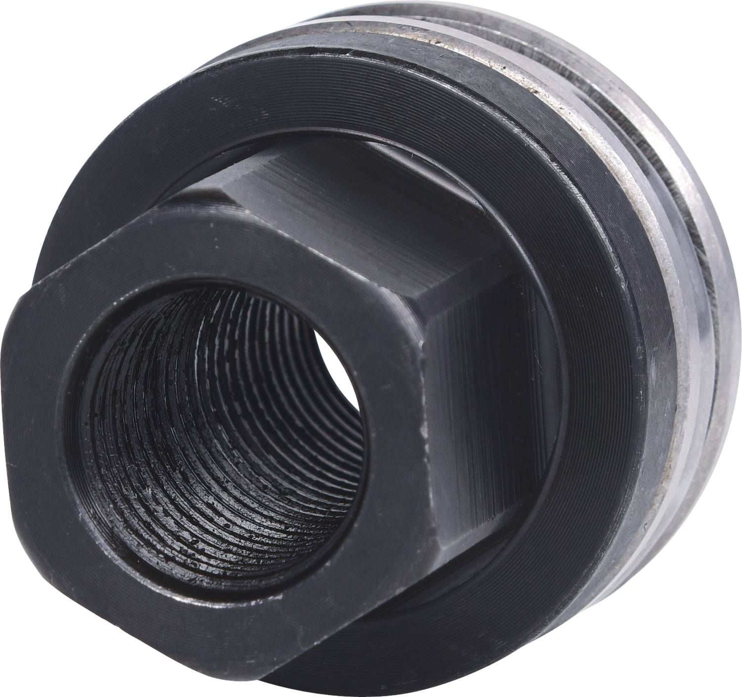 Eine schwarze Metallmutter mit innerem Gewinde, von schräg oben fotografiert, zeigt ihre zylindrische Form und die Struktur des Gewindes.